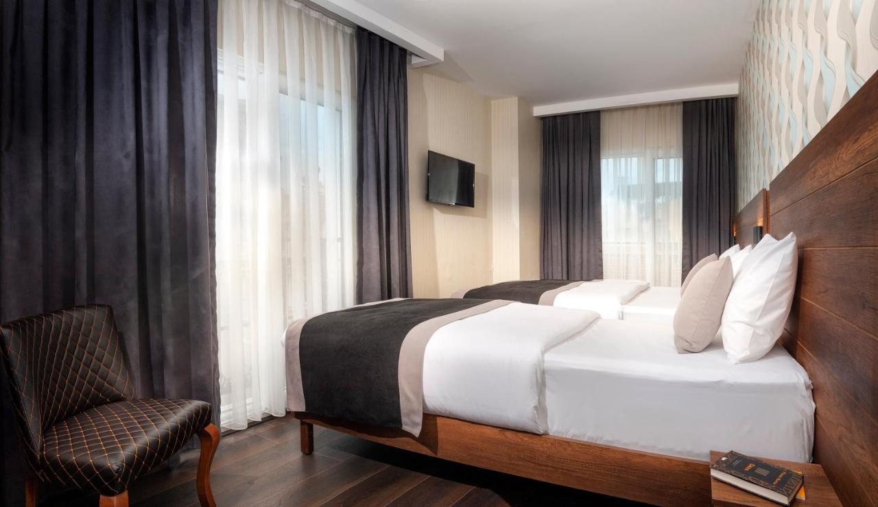 Hotel Bossuite Business *