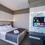 Arena Luxury Suites Hotel