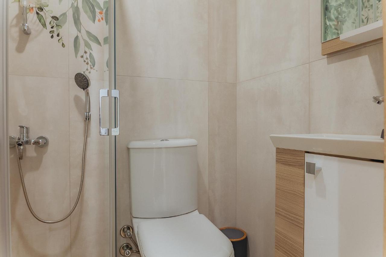 Marcian's Column - Orange And Blue Hotel