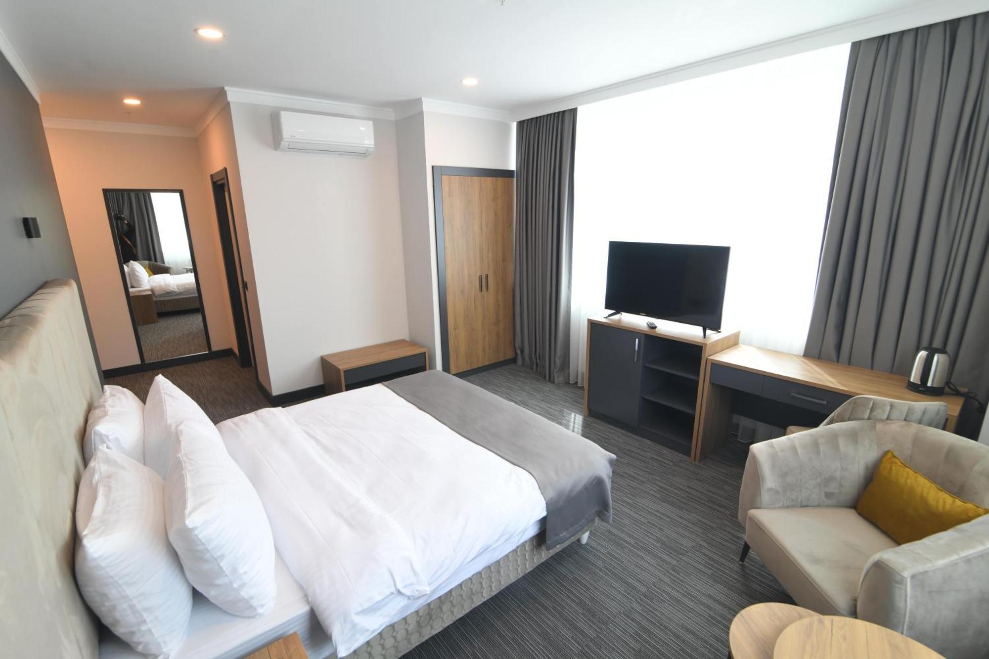 Home Plus Hotel Hotel