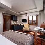 Taksim Camdali Suit